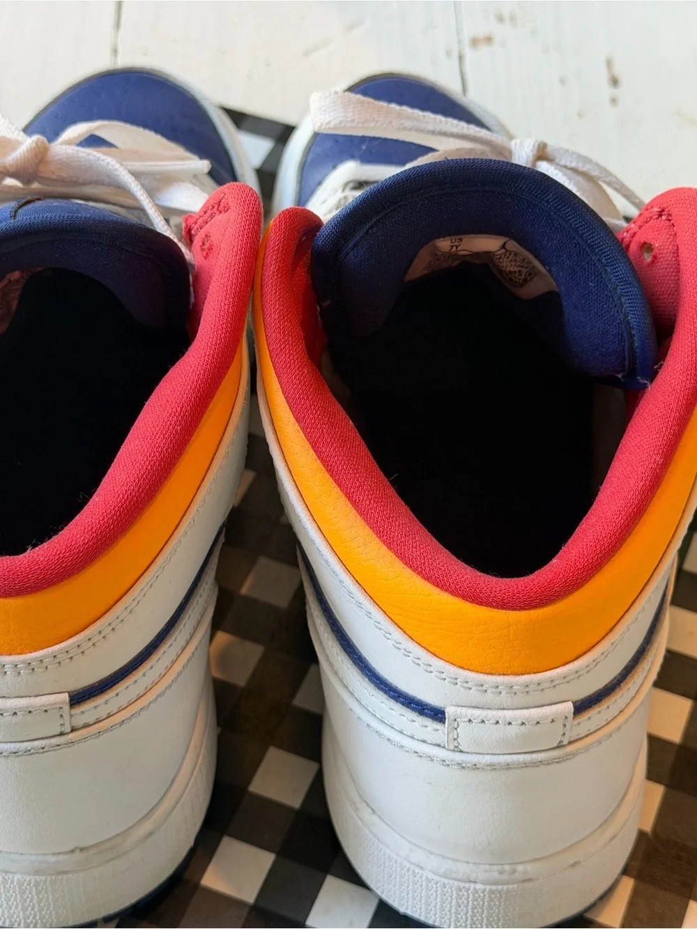 Jordan 1 Mid Top Sneakers in Navy, White & Red